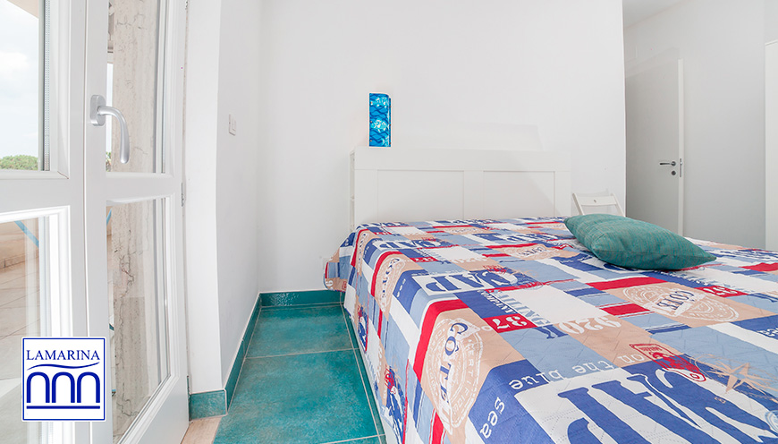 1_11_casa-vacanze-blumarine-portocesareo-camera-da-letto.jpg