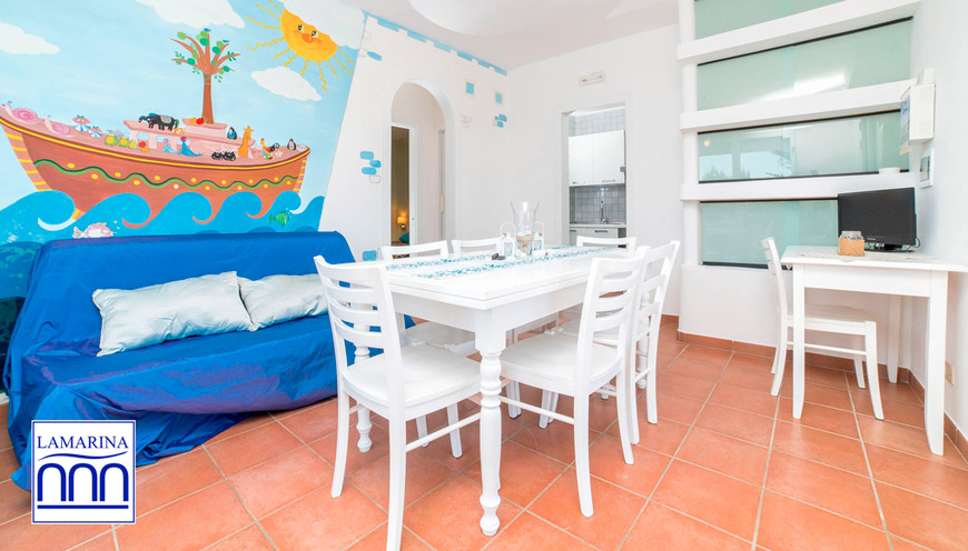 1_18_residence-poseidonia-casa-primo-piano-soggiorno.jpg