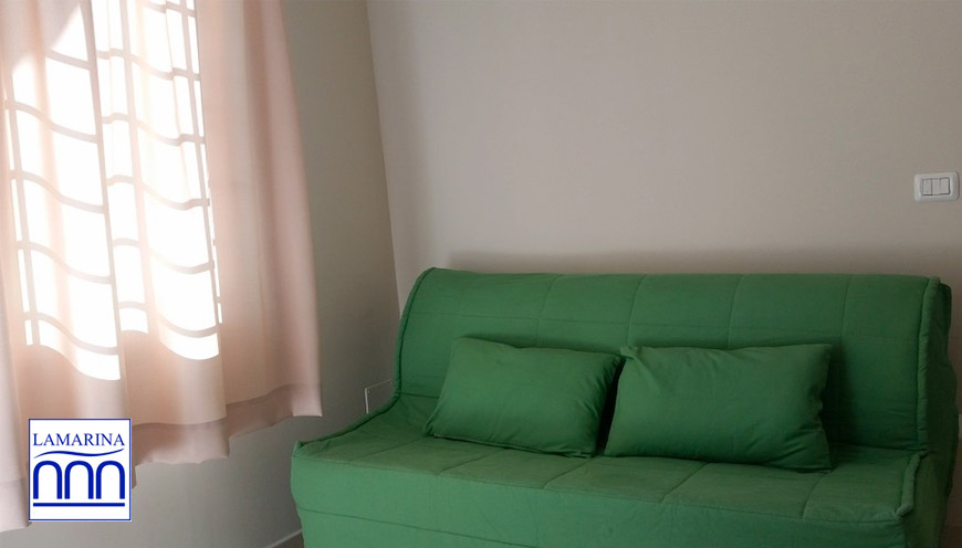 1_19_residence-poseidonia-bilo-soggiorno-angolo-cottura.jpg