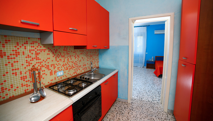 1_27_angolo-cottura-monolocale-residence-orange.jpg