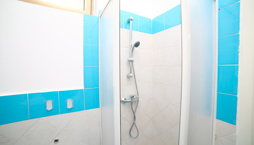 1_27_bagno-doccia-monolocale-residence-orange.jpg