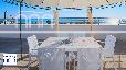 zoom dettaglio: 1_10_bilocale-hookipa-fronte-spiaggia-pranzo-sul-mare.jpg