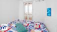 zoom dettaglio: 1_11_casa-vacanze-blumarine-portocesareo-balcone-camera-da-letto.jpg