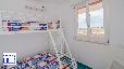 zoom dettaglio: 1_11_casa-vacanze-blumarine-portocesareo-cameretta-con-vista.jpg